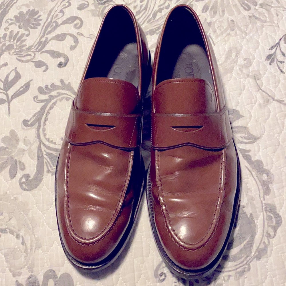 Tod’s famous Italian made penny loafers.